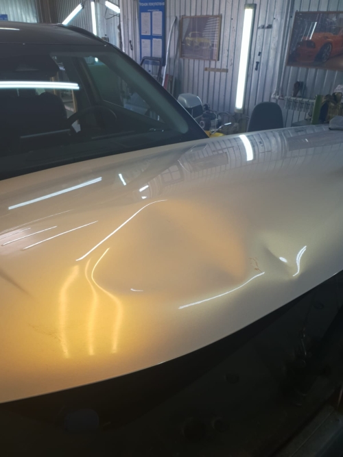 Удаление (ремонт) вмятины без покраски, на капоте автомобиля Хавал (Haval)